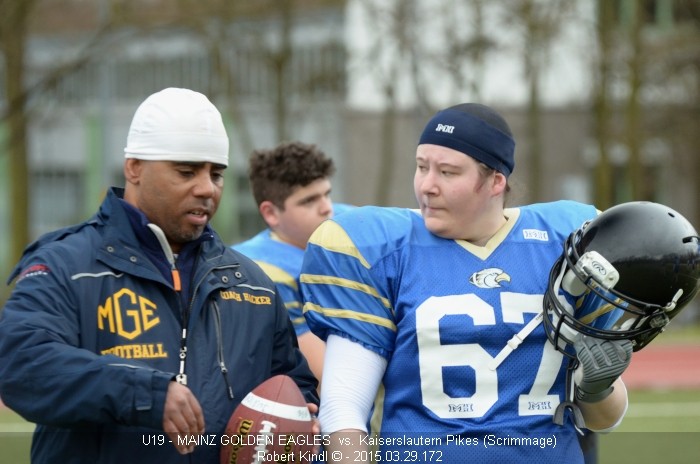 Football Scrimmage: Rücksprache mit dem Coach